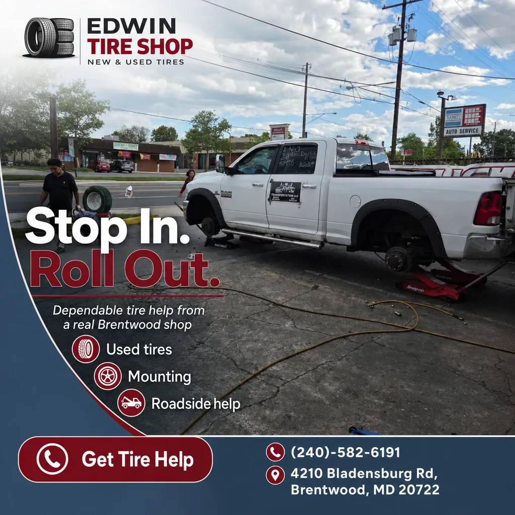 Edwin Tire Shop ad showing a white pickup on jacks with wheels removed, technicians working and shop contact information for Brentwood, MD