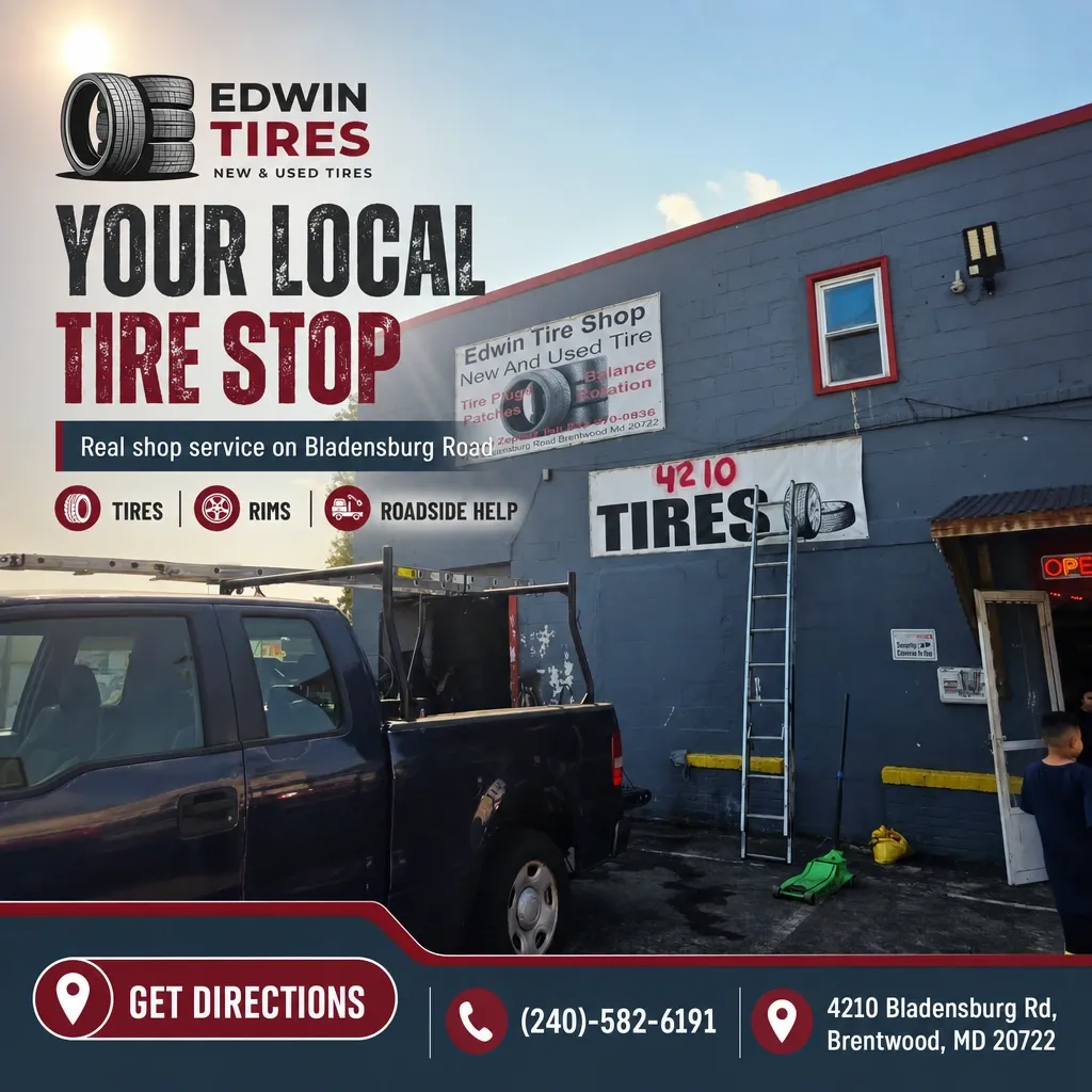 Exterior of Edwin Tires shop on Bladensburg Road with signage, pickup truck in foreground, ladder and open service door.