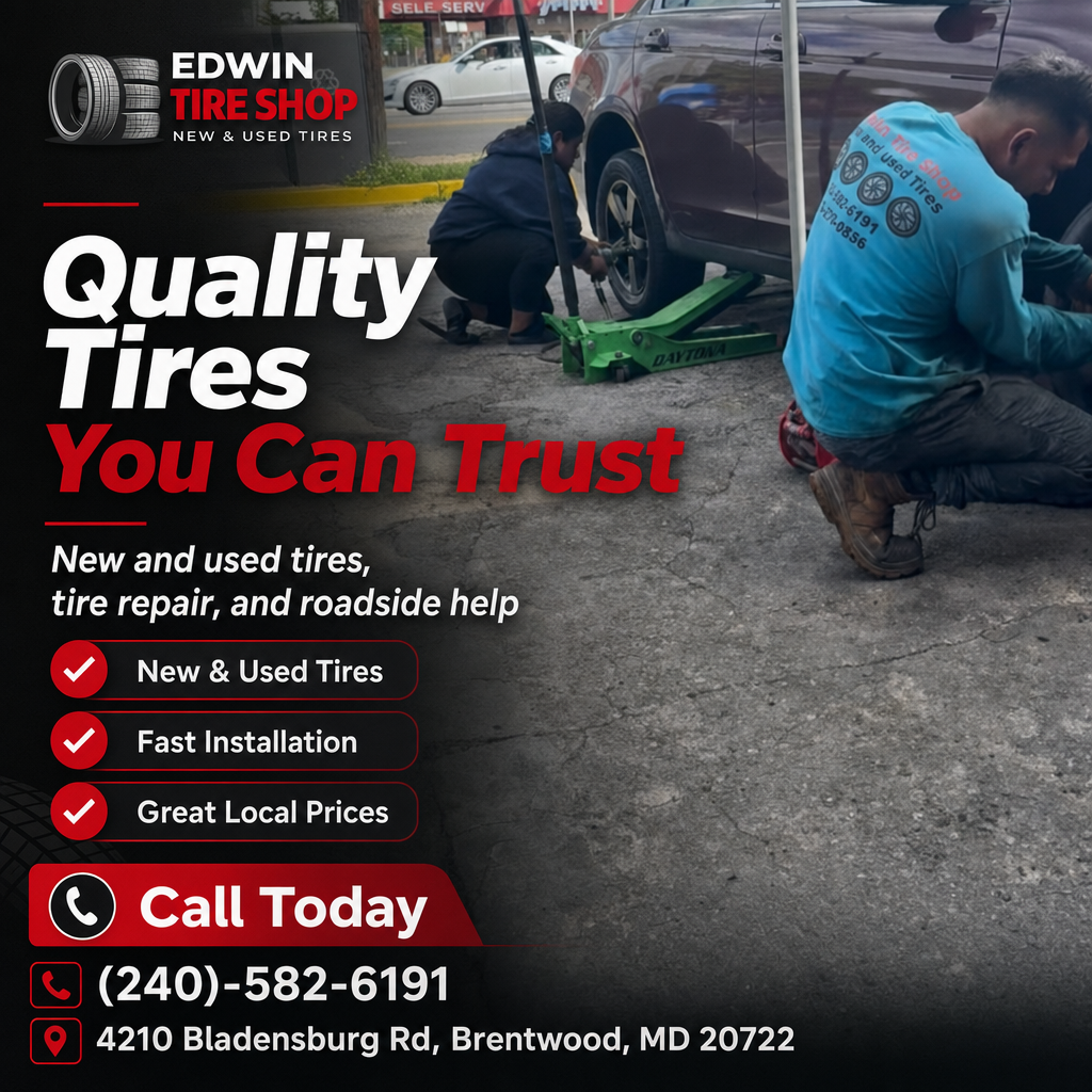 Technicians changing a car tire at a local tire shop with promotional text and contact information.